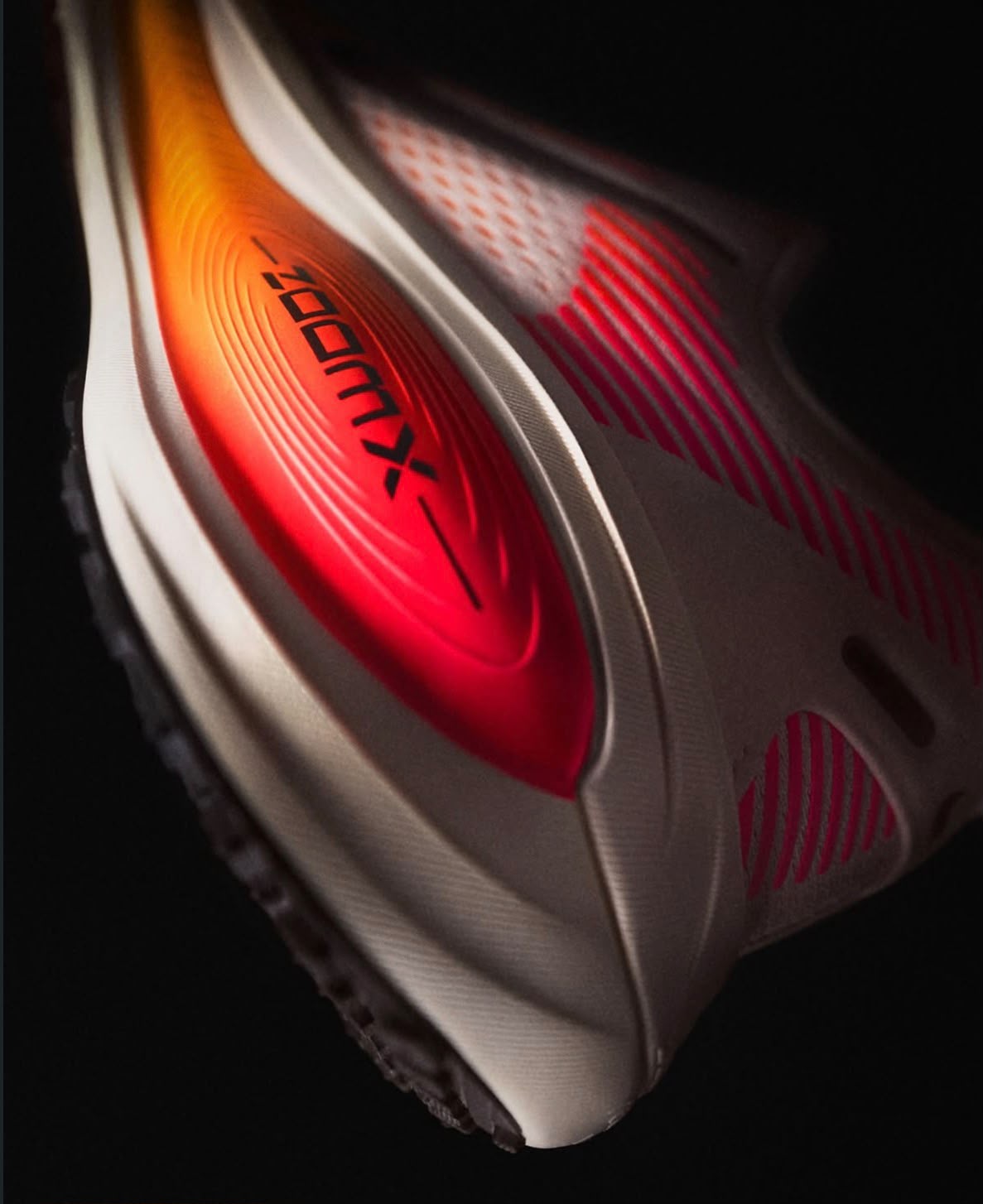 Nike ZoomX creative: Light, shadow and a glowing ZoomX detail make the running shoe feel kinetic eve